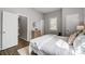 Main Bedroom features wood look floors and a door to an en suite bathroom at 1901 Parkdale Ave, Gastonia, NC 28052