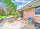 Outdoor patio area with comfortable seating and a sliding glass door at 1910 York Hwy, York, SC 29745