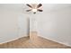 Bedroom featuring wood flooring, ceiling fan, and access to an adjoining room at 219 Edinburgh Ct, Mount Holly, NC 28120