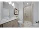 Modern bathroom showcasing a glass-enclosed shower, sleek vanity, and contemporary fixtures at 235 Boxelder Rd, Clover, SC 29710