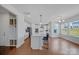 Open-concept kitchen featuring a large kitchen island with modern pendant lighting and stainless steel appliances at 235 Boxelder Rd, Clover, SC 29710