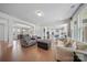 Spacious living room with hardwood floors, lots of natural light and open layout to the kitchen and dining areas at 235 Boxelder Rd, Clover, SC 29710