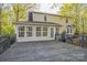 Back of house with large wooden deck and many windows for lots of natural light at 2371 Lazy Oak Dr, Lancaster, SC 29720