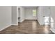 Upstairs bedroom featuring an alcove, neutral paint, hardwood floors, and a bright window at 2371 Lazy Oak Dr, Lancaster, SC 29720