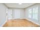 Sunlit room with hardwood floors, fresh paint, and a large closet at 2371 Lazy Oak Dr, Lancaster, SC 29720