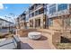 Exterior image of community area featuring a covered circular bench with contemporary patio seating at 2401 Euclid Ave, Charlotte, NC 28203