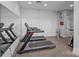 Gym featuring treadmills, mirrored walls, and an area to hydrate after your workout at 2401 Euclid Ave, Charlotte, NC 28203