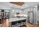 Modern kitchen features grey cabinets, quartz countertops, an island, and stainless steel appliances at 2401 Euclid Ave, Charlotte, NC 28203