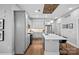 Modern kitchen features grey cabinets, quartz countertops, an island, and stainless steel appliances at 2401 Euclid Ave, Charlotte, NC 28203