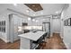 Modern kitchen features grey cabinets, quartz countertops, an island, and stainless steel appliances at 2401 Euclid Ave, Charlotte, NC 28203