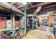 Unfinished basement with exposed pipes, ductwork, concrete slab, and brick foundation provides space for storage at 292 Mocksville Hwy, Statesville, NC 28625
