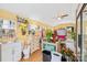 Versatile interior space with sink, storage, and natural light. Would work well as a florist shop at 292 Mocksville Hwy, Statesville, NC 28625
