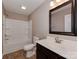 Bathroom featuring a bathtub with shower, vanity and vinyl flooring at 317 Contentment Dr, Locust, NC 28097