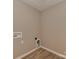 Empty laundry room with vinyl floors and washer and dryer hookups at 317 Contentment Dr, Locust, NC 28097