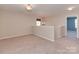 Loft featuring neutral carpet, recessed lighting, chandelier and views to adjacent rooms at 317 Contentment Dr, Locust, NC 28097