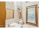Practical bathroom with a single sink vanity, toilet, and a shower-tub combo at 3605 Ridgetop Rd, Sherrills Ford, NC 28673