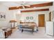 Bedroom featuring white walls and ceiling with wooden beams and a ceiling fan at 3605 Ridgetop Rd, Sherrills Ford, NC 28673