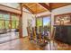 Bright dining room with vaulted ceilings, chandelier, and views to the living room and outdoors at 3605 Ridgetop Rd, Sherrills Ford, NC 28673