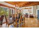 Bright dining room with vaulted ceilings, chandelier, and views to the living room and outdoors at 3605 Ridgetop Rd, Sherrills Ford, NC 28673