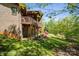 Exterior of the home with wooden decks, and a landscaped yard with flowers at 3605 Ridgetop Rd, Sherrills Ford, NC 28673