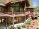 A beautiful elevated deck on this house surrounded by lush landscaping at 3605 Ridgetop Rd, Sherrills Ford, NC 28673
