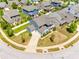 Aerial view of the home with a three car garage, manicured yard, and cul-de-sac street at 4013 Highgate Ln # 2B-78, Lancaster, SC 29720