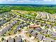 Neighborhood aerial showcasing community layout with ponds, green spaces and many homes at 4013 Highgate Ln # 2B-78, Lancaster, SC 29720