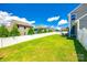 Spacious backyard with lush green grass and a white privacy fence at 4013 Highgate Ln # 2B-78, Lancaster, SC 29720