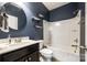 Well-lit bathroom with a vanity, toilet, bathtub, shower, and neutral walls at 4013 Highgate Ln # 2B-78, Lancaster, SC 29720