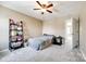 Bright bedroom boasts plush carpet flooring, neutral walls, and a ceiling fan at 4013 Highgate Ln # 2B-78, Lancaster, SC 29720