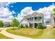 Charming two-story home with a balcony, lovely landscaping, and a well-kept lawn at 4013 Highgate Ln # 2B-78, Lancaster, SC 29720