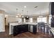 Open-concept kitchen with a large island, stainless steel appliances, and seamless flow to dining and living areas at 4013 Highgate Ln # 2B-78, Lancaster, SC 29720