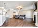 Spacious living room boasts hardwood floors, neutral walls, and a comfortable sectional sofa at 4013 Highgate Ln # 2B-78, Lancaster, SC 29720