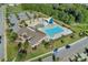 Stunning aerial view of the community pool and recreation area with mature trees and parking at 4013 Highgate Ln # 2B-78, Lancaster, SC 29720