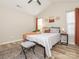 Light-filled bedroom with vaulted ceiling, fan, modern decor, and wood-look flooring at 4628 Arthur Way, Rock Hill, SC 29732