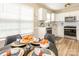 Inviting dining area with an eat-in kitchen, showcasing a modern kitchen with stainless steel appliances at 4628 Arthur Way, Rock Hill, SC 29732