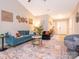 Comfortable living room with vaulted ceilings, stylish decor, and a mix of modern and classic furniture at 4628 Arthur Way, Rock Hill, SC 29732