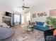 Bright living room featuring vaulted ceilings, fireplace, stylish furnishings, and natural light at 4628 Arthur Way, Rock Hill, SC 29732
