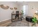 Bright office features a modern desk, comfortable seating, and stylish decor, perfect for a productive workspace at 4628 Arthur Way, Rock Hill, SC 29732