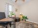 Bright office features a modern desk, comfortable seating, and stylish decor, perfect for a productive workspace at 4628 Arthur Way, Rock Hill, SC 29732