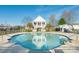 Community swimming pool with view of building and lounge chairs at 4628 Arthur Way, Rock Hill, SC 29732