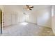 Spacious bedroom with a ceiling fan, large closet, and lots of natural light at 472 Bellingshire Dr, Mt Ulla, NC 28125