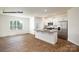 Open floorplan featuring an island with barstool seating and stainless steel appliances in the kitchen at 533 Trading Post Ln, York, SC 29745