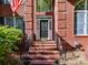 Close-up view of brick steps and front door at 7012 Chadwyck Farms Dr, Charlotte, NC 28226