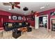 Home theater with comfortable seating, projector, and a ceiling fan at 7012 Chadwyck Farms Dr, Charlotte, NC 28226
