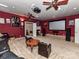 Home theater with comfortable seating, projector, and a large screen at 7012 Chadwyck Farms Dr, Charlotte, NC 28226