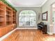 Living room featuring a large window at 7012 Chadwyck Farms Dr, Charlotte, NC 28226