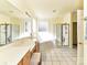 Bright main bathroom with double vanity, soaking tub, and separate shower, perfect for relaxation at 7012 Chadwyck Farms Dr, Charlotte, NC 28226