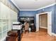 Office with hardwood floors and desk at 7012 Chadwyck Farms Dr, Charlotte, NC 28226