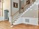 Staircase with hardwood and carpet at 7012 Chadwyck Farms Dr, Charlotte, NC 28226